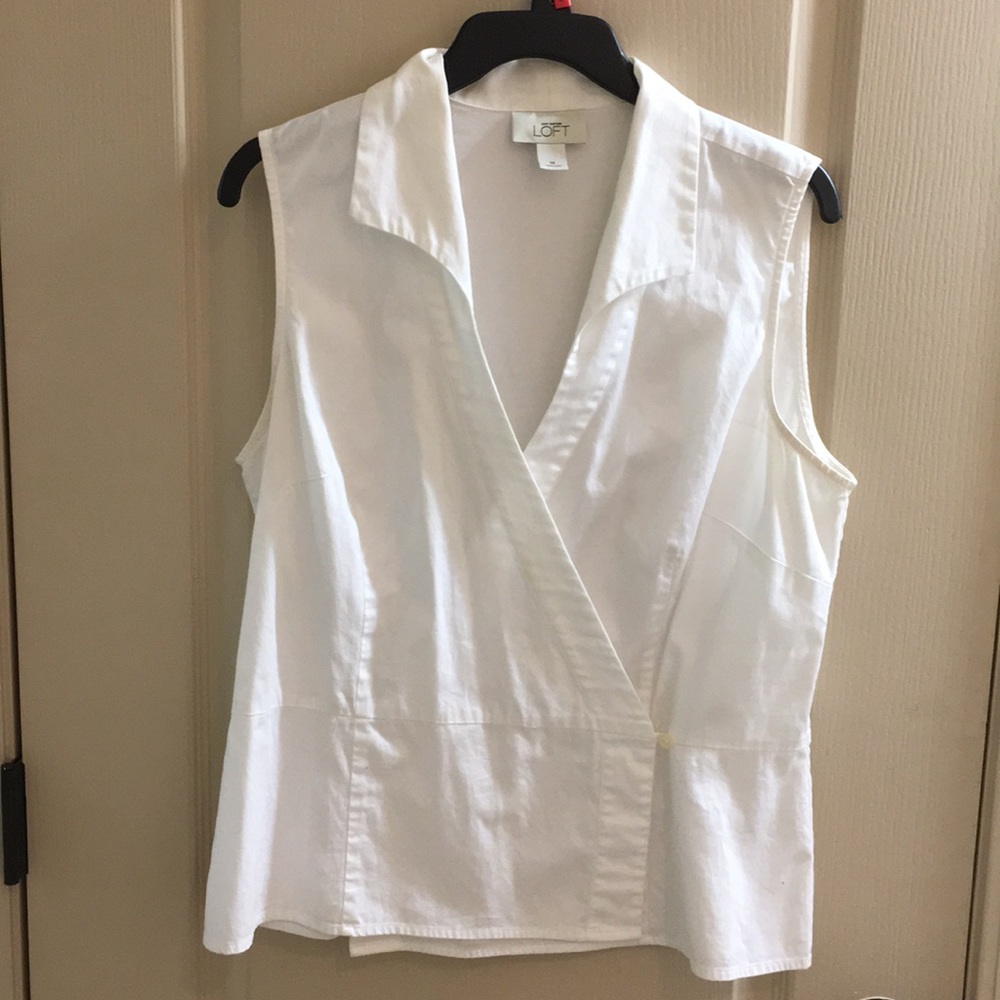 White sleeveless blouse